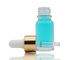 Warna Bening 15ml Bentuk Bulat Botol Kaca Kosmetik Dengan Emas Aluminium Dropper